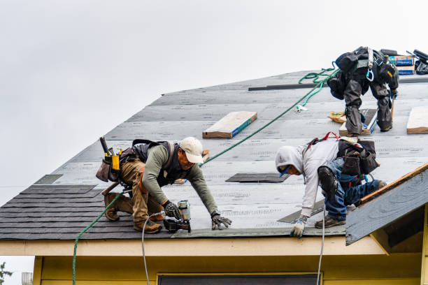 Professional Gutter Installation technician working in East Fultonham, OH